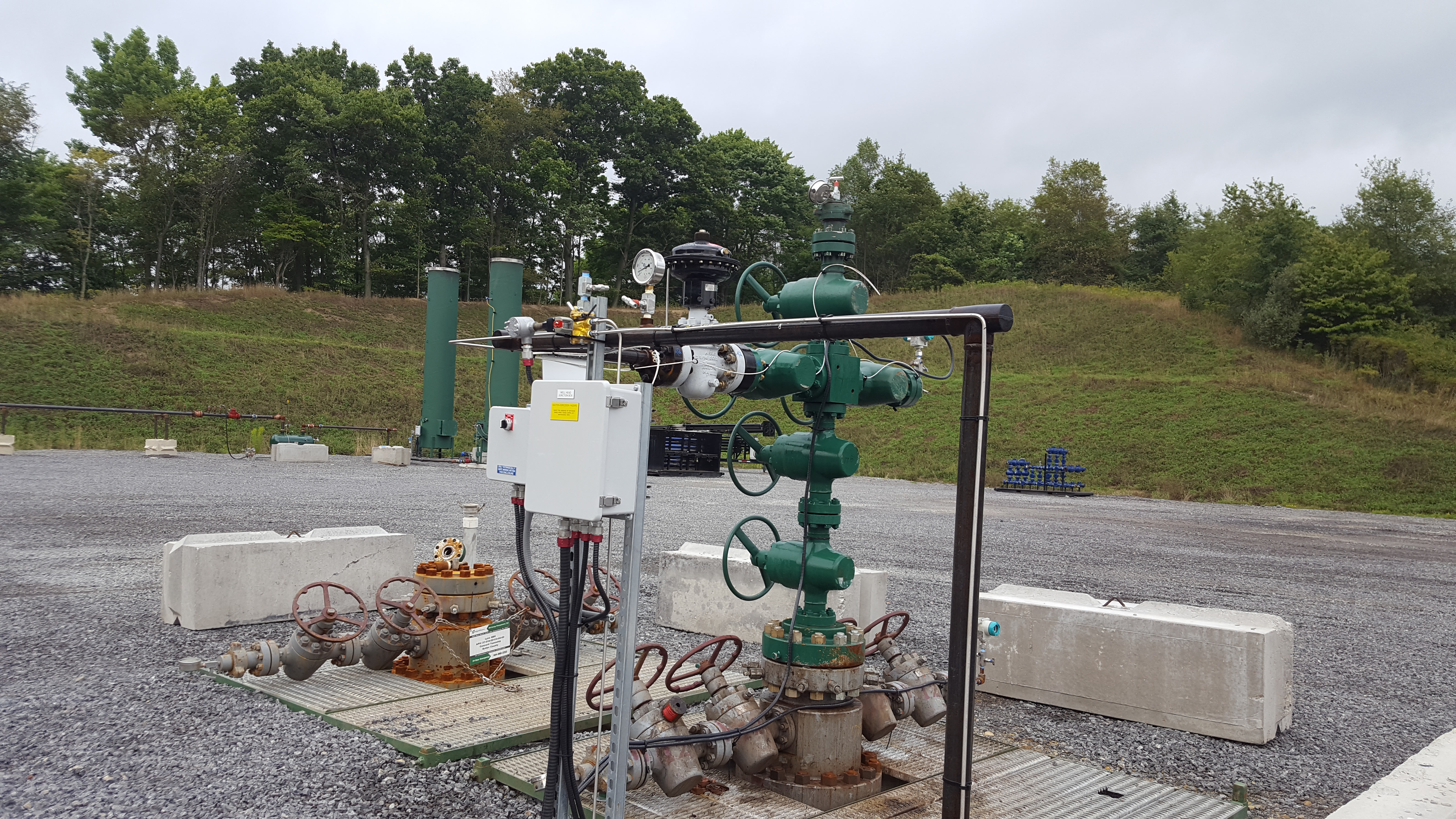 A well head installed at a job site.