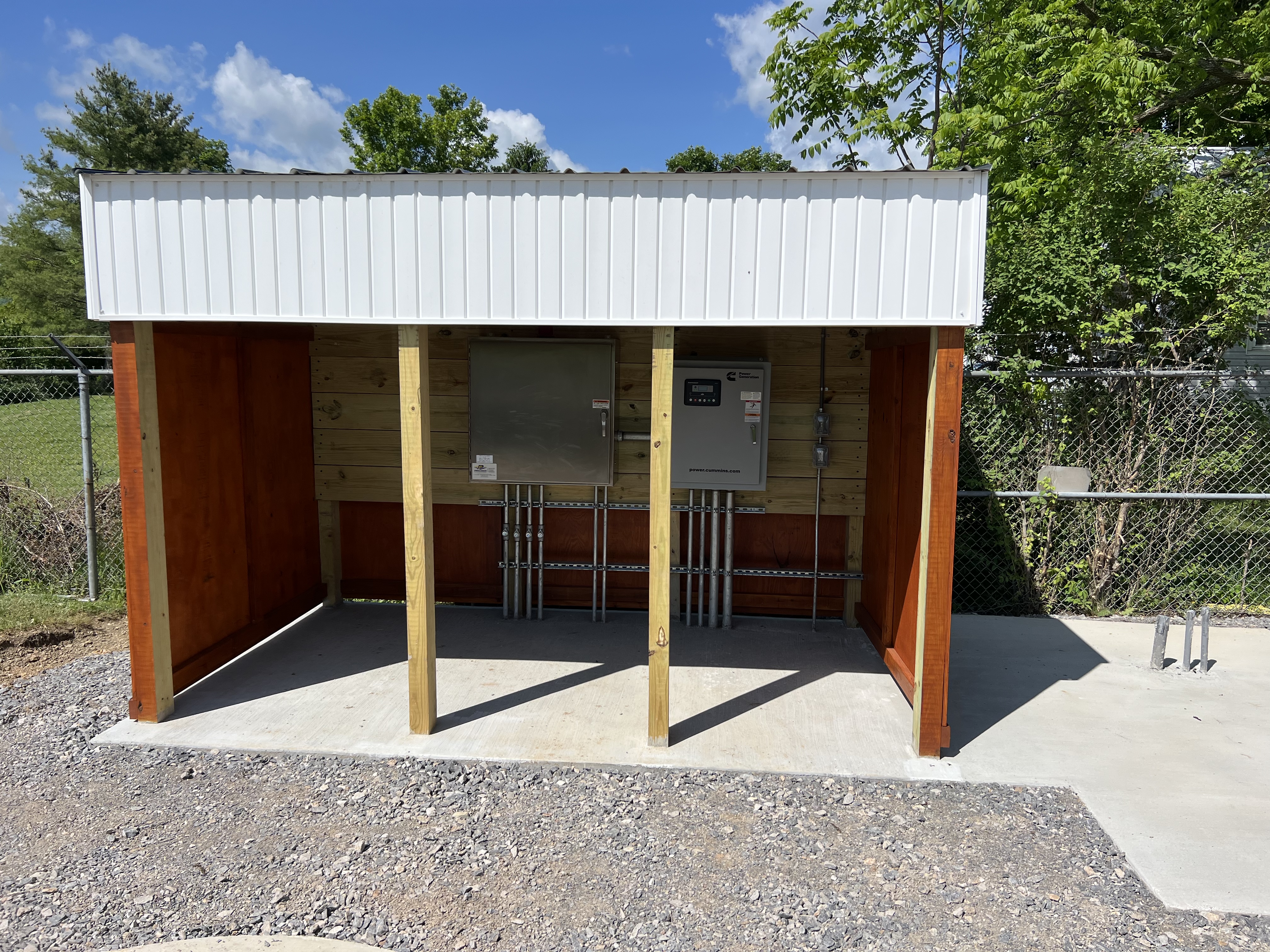 Installation of a couple control panels under a custom made canopy.